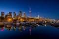 Toronto city skyline at Night fromÃÂ Marina Quay West, Ontario, Canada Royalty Free Stock Photo